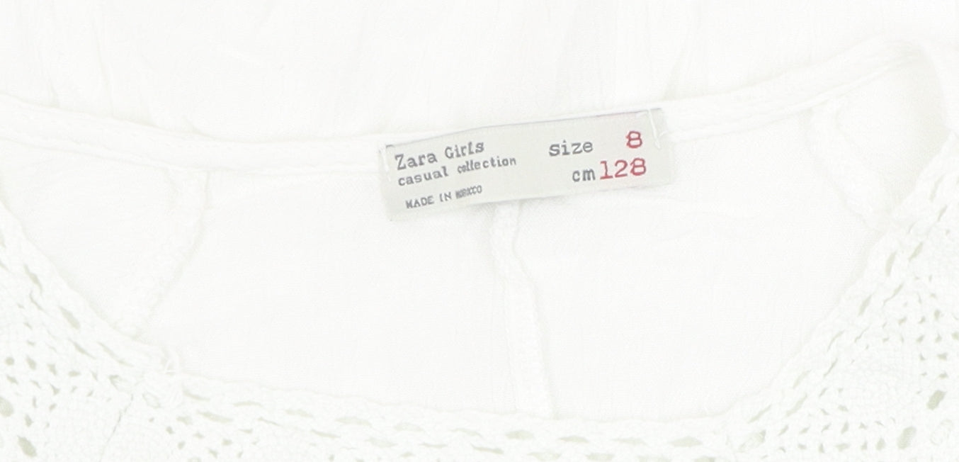 Close-up detail of Zara girls’ white blouse 7-8 years casual crochet accents