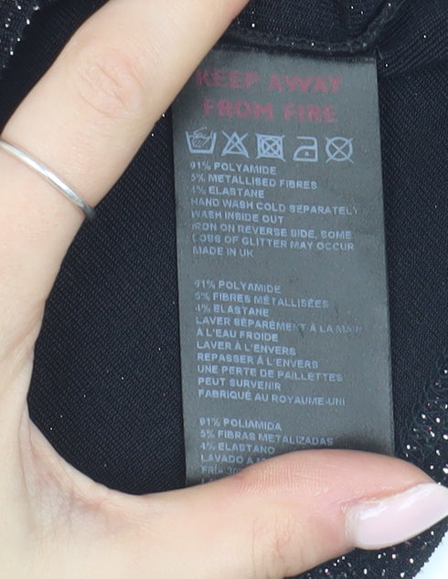 Brand and care label for Urban Outfitters Black Cropped Glitter Blouse M