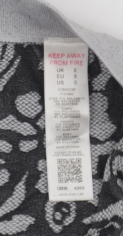 Close-up detail of ASOS Women's Grey Animal Print Leggings S
