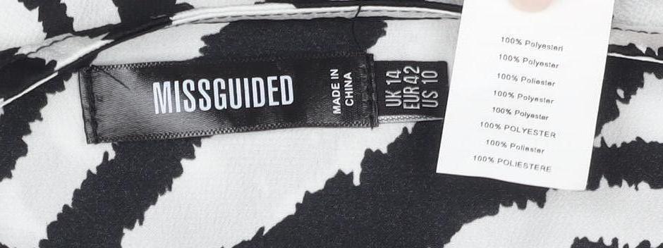 Close-up detail of Missguided Women's Black Kimono Blouse, UK 14