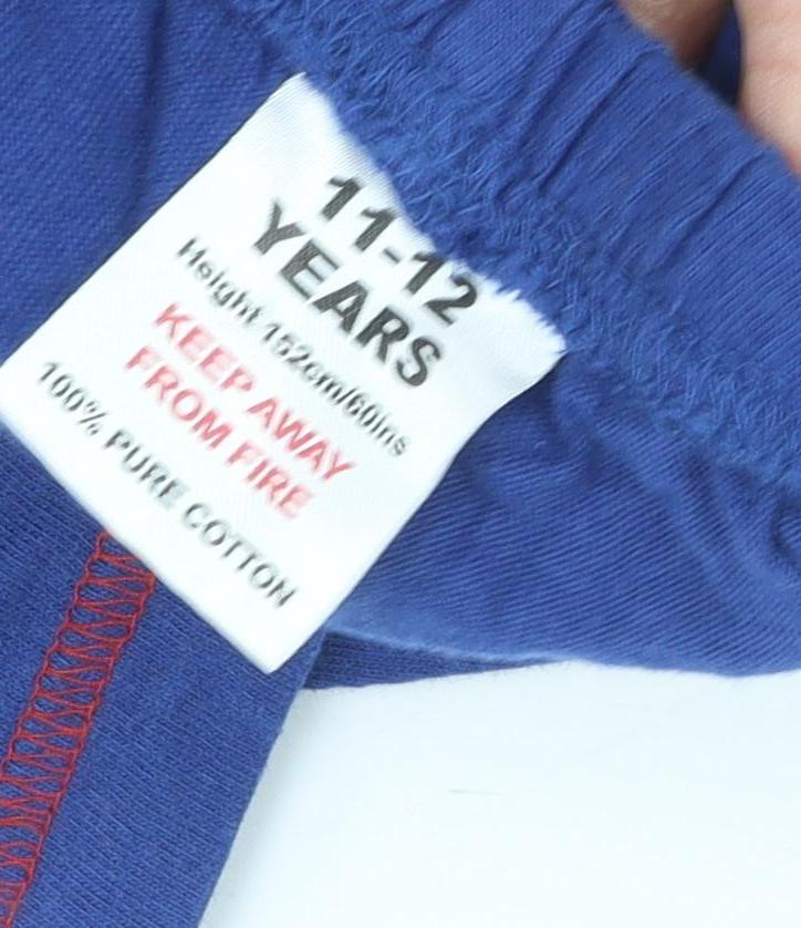 Close-up detail of boys’ blue team gb straight trousers 11-12 years