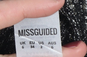 Brand and care label for Missguided Women's Black Cropped Mock Neck Blouse, size 6