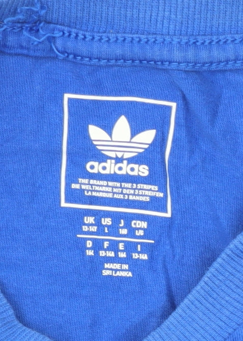 Brand and care label for Adidas boys’ blue t-shirt sports classic 13-14 years