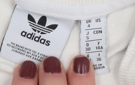 Brand and care label for adidas Women's White T-Shirt, size 4, Casual Style