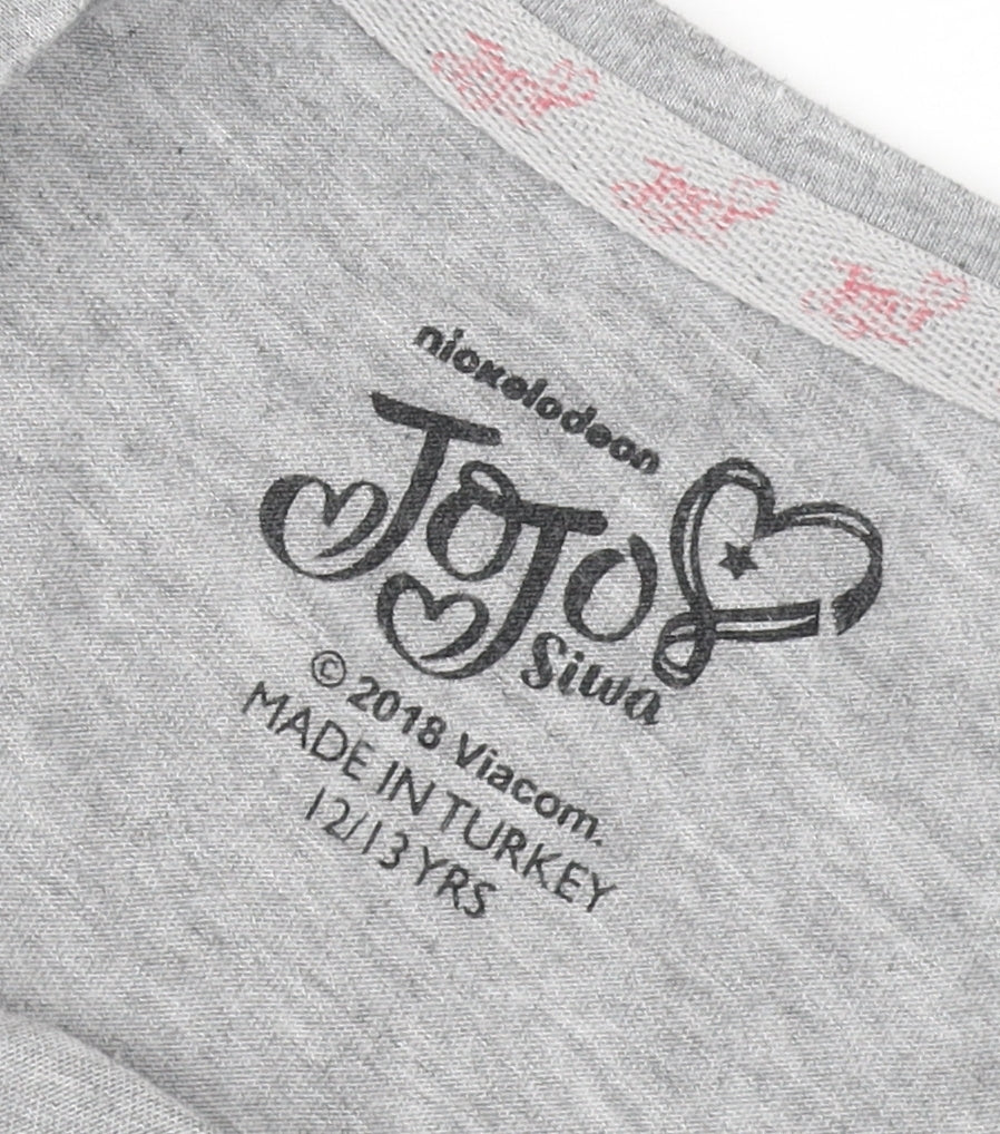 Brand and care label for JoJo Siwa girls’ grey sequined t-shirt 12-13 years