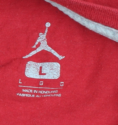 Close-up detail of Jordan Flight Women's Red Cropped T-Shirt Crew Neck, size L