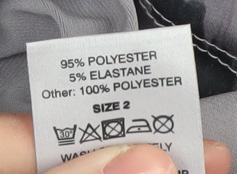 Brand and care label for A Postcard From Brighton Grey Animal Print Blouse