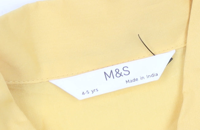 Close-up detail of Marks & Spencer girls’ yellow floral button-up crop top 4-5 years