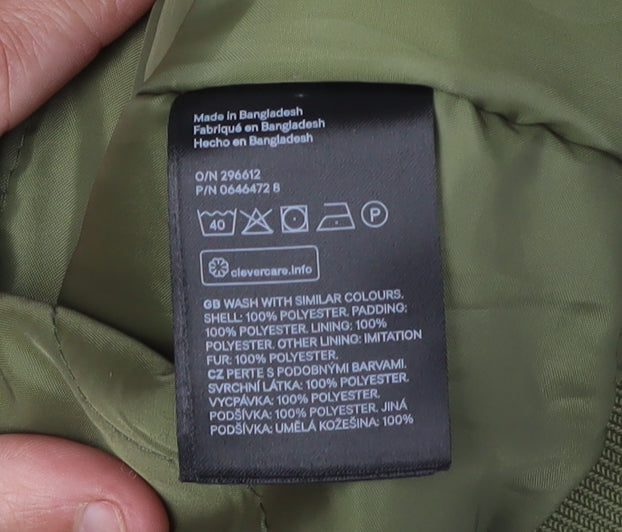 Brand and care label for H&M girls’ green bomber jacket 13-14y with fur trim
