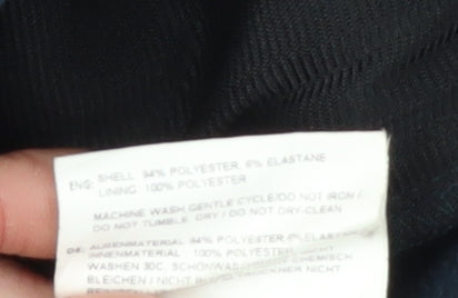 Brand and care label for Nord Cape boys’ blue adventure jacket, size 13