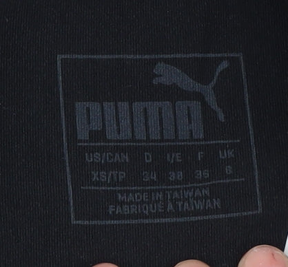Brand and care label for Puma Women's Black Seamless Leggings - XS