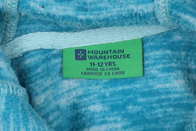 Brand and care label for Mountain Warehouse girls’ blue full zip hoodie 11-12 years fleece
