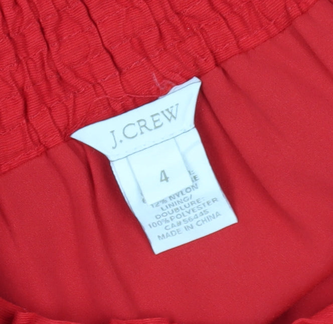 Brand and care label for J.Crew Women's Red Knee-Length A-Line Skirt, size 4