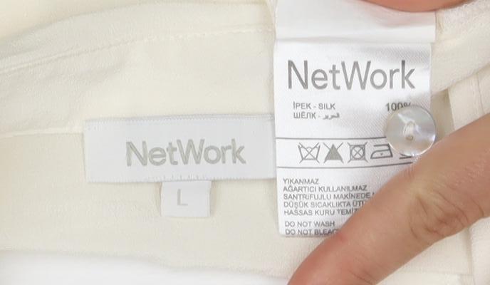 NetWork Women's Ivory Silk Sleeveless Button-Up