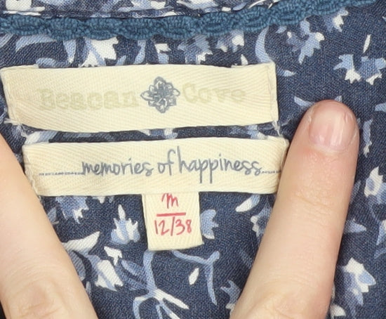 Brand and care label for Desigual Women's Blue Floral Bohemian Blouse, size 12