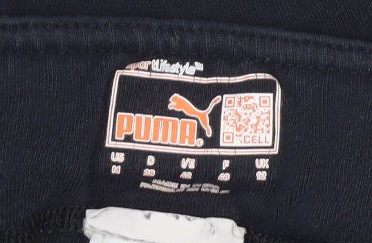 Close-up detail of Puma Women's Black Leggings, size 12 Slim, Fit Activewear
