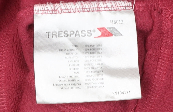 Brand and care label for Trespass girls’ red fleece 1/2 zip sweatshirt, size 15-16, years