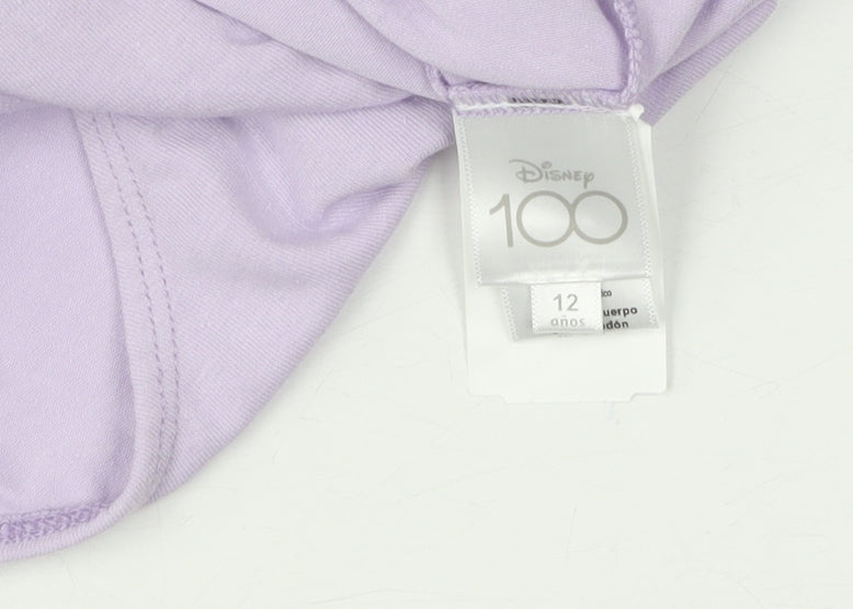 Brand and care label for Disney girls’ purple cotton t-shirt with dumbo and stitch -, size 12