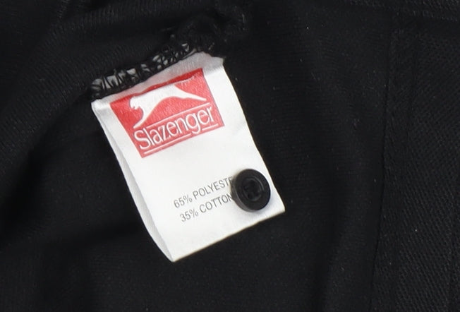 Brand and care label for Slazenger girls’ black polo shirt, size 9-10, years, logo accents
