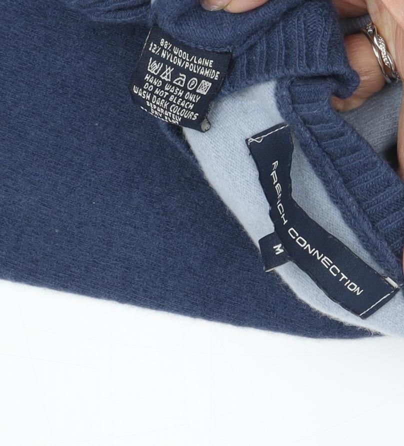 Close-up detail of French Connection boys’ blue m jumper wool blend