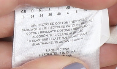 Brand and care label for Joe Browns Women's Ivory Cut-Off Denim Shorts, size 8