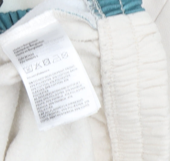 Brand and care label for H&M girls’ beige adventure graphic sweatshirt 10-12 years