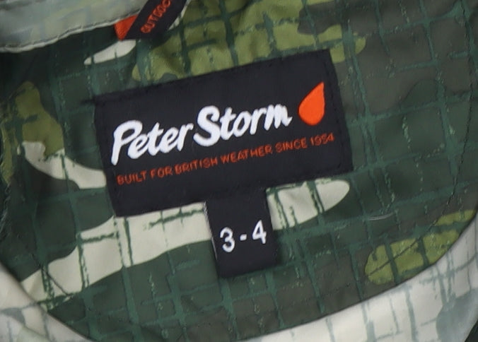Close-up detail of Peter Storm boys’ green camouflage rain coat, size 3-4, years