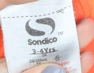 Brand and care label for Sondico boys’ orange t-shirt, size 3-4, years, sports style