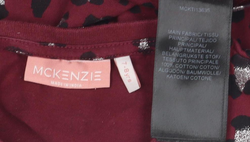 Close-up detail of Mckenzie girls’ red animal print t-shirt 7-8 years