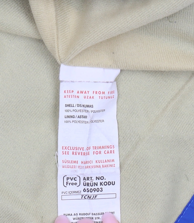 Brand and care label for Puma boys’ blue pullover sweatshirt, size UK 12, logo accent