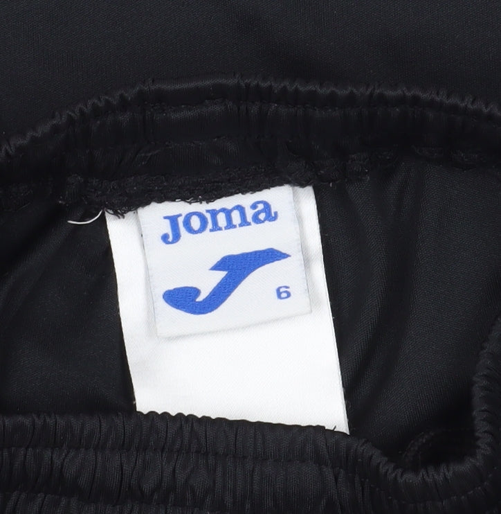 Close-up detail of Joma boys’' black athletic shorts, size 10