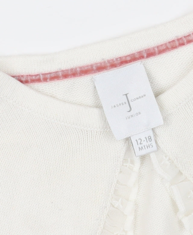Close-up detail of Jasper Conran girls’ white shrug 12-18 months