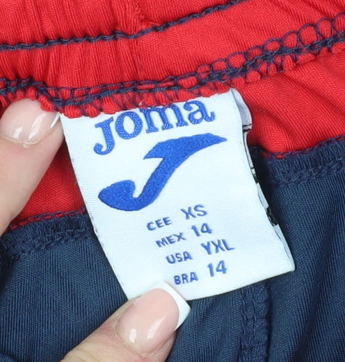 Close-up detail of Joma boys’ blue xs athletic shorts, breathable sportswear