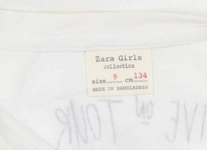Close-up detail of Zara girls’ white music graphic long sleeve t-shirt 9 years