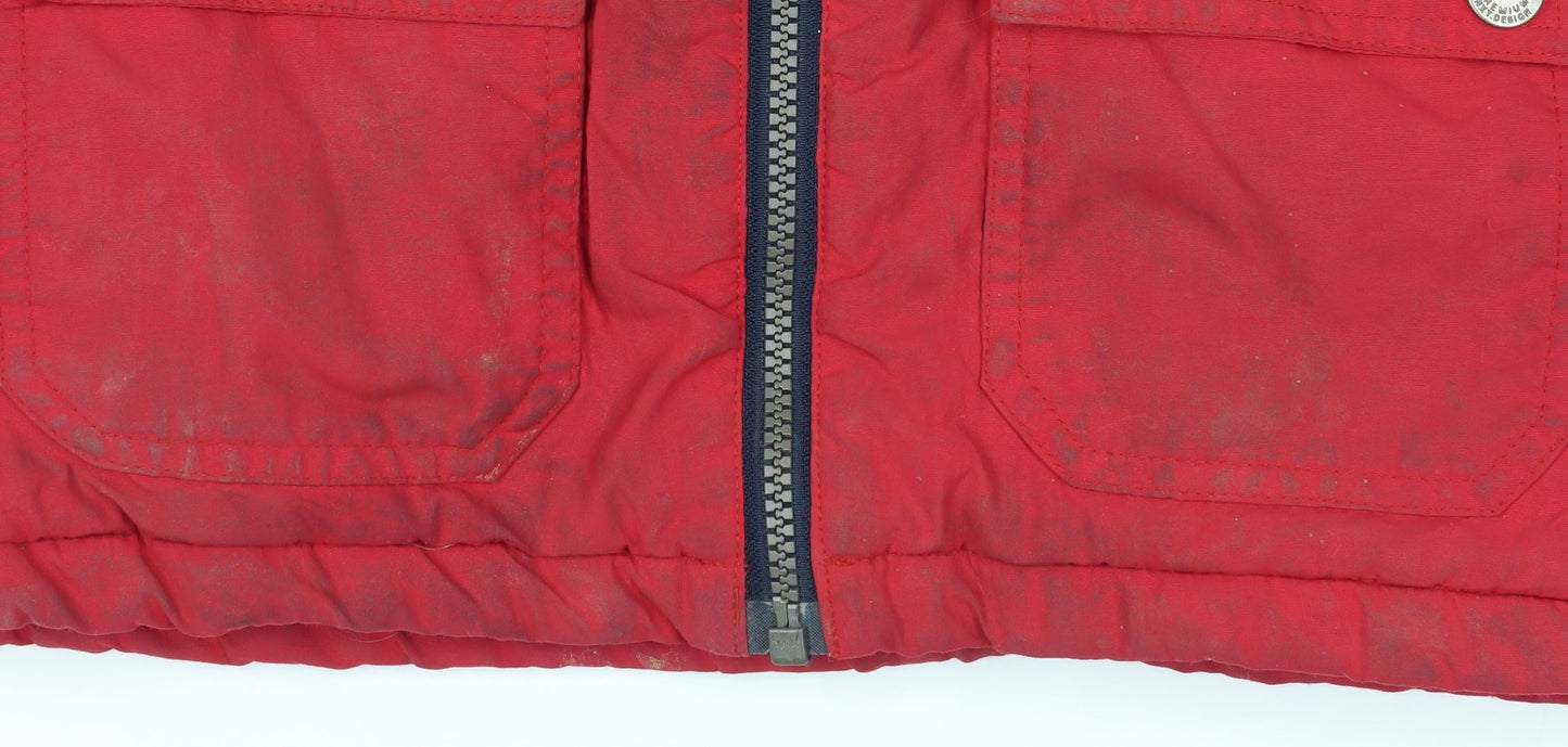 Brand and care label for Next boys’ red hooded parka jacket 4 years