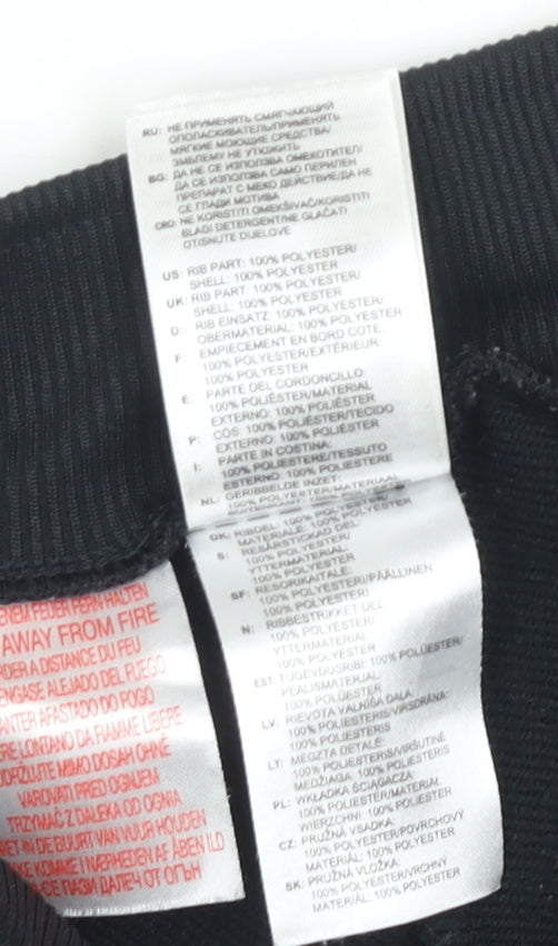 Brand and care label for Adidas girls’ black jogger trousers 5-6 years