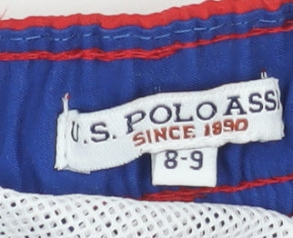 Close-up detail of U.S. Polo Assn. boys’ red blue stars swim shorts 8-9 years
