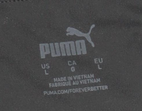 Close-up detail of Puma Women's Black Leggings L for Running & Training