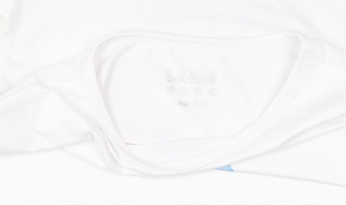 Brand and care label for Disney Frozen II Cropped White T-Shirt for girls’ 2-3 years