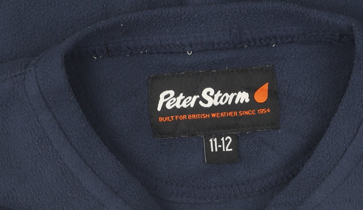 Brand and care label for Peter Storm boys’' blue fleece pullover sweatshirt 11-12y