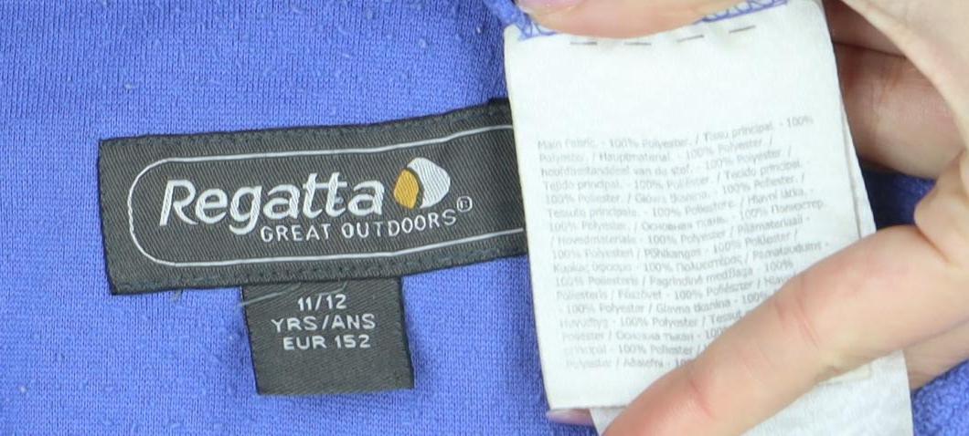 Close-up detail of Regatta girls’' blue fleece jacket, size 11-12, winter essential