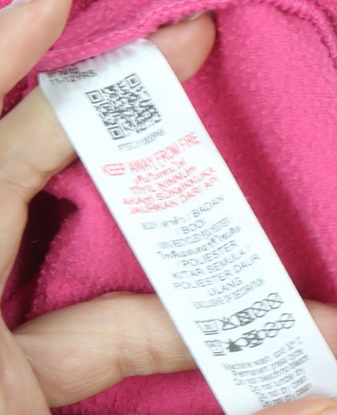 Brand and care label for Peter Storm girls’ pink fleece sweatshirt 11-12 years, 1/2 zip