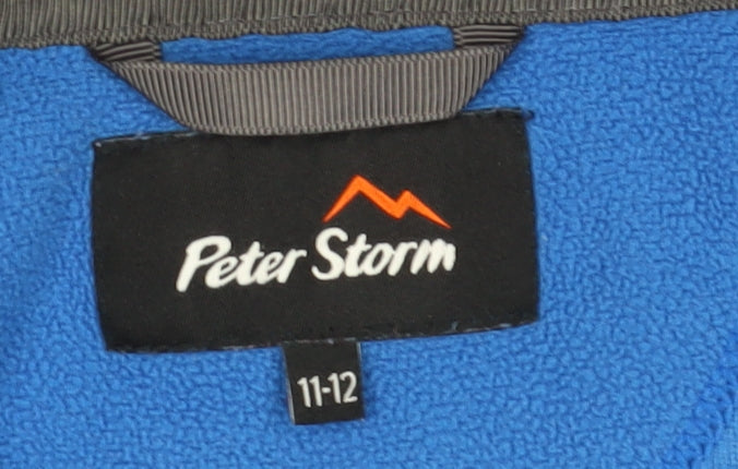 Close-up detail of Peter Storm boys’ blue fleece 1/2 zip sweatshirt 11-12 years