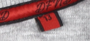 Brand and care label for DFND boys’ grey henley sweatshirt, 13 years, 1/2 zip, logo