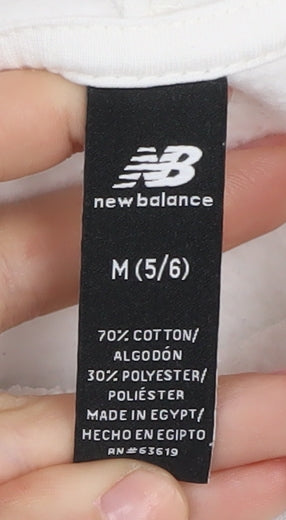 Close-up detail of New Balance girls’ white hoodie, size 5-6, years pullover