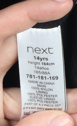 Close-up detail of Next boys’ black hooded puffer jacket 14 years