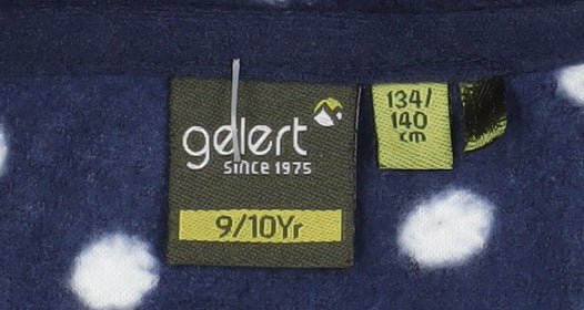 Brand and care label for Gelert girls’ blue polka dot fleece jacket 9-10 years