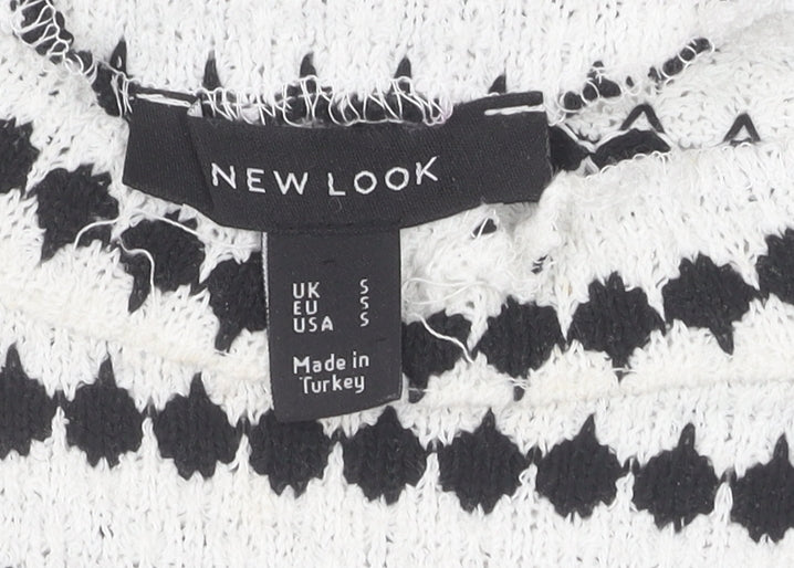 Close-up detail of New Look women’s knit jumper - black/white, size S