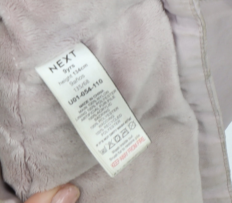 Brand and care label for Next girls’ pink hooded parka coat 9 years