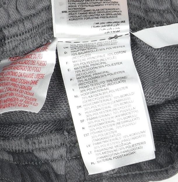 Brand and care label for Adidas boys’ grey camouflage athletic shorts 2-3 years